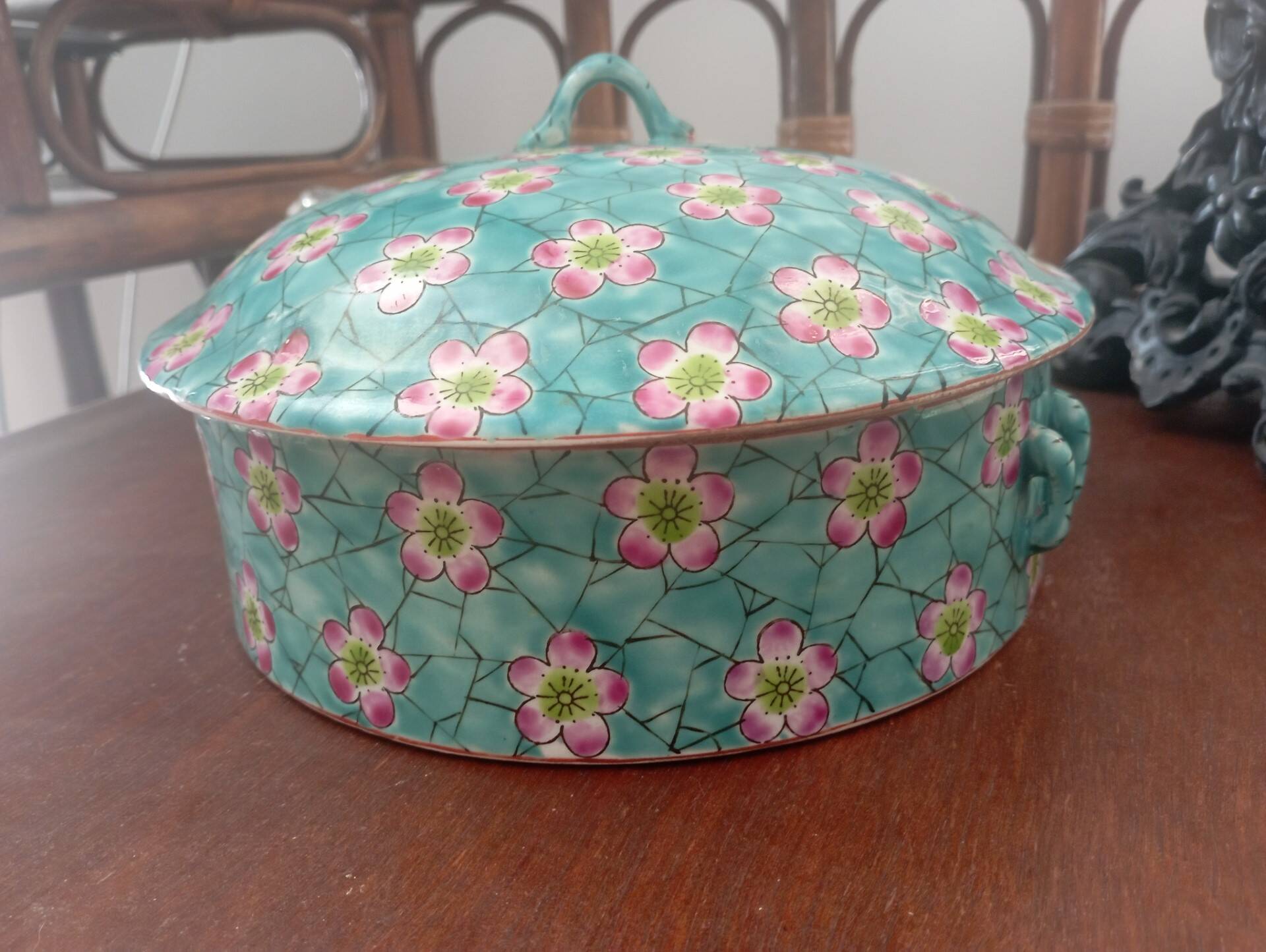 Old glazed ceramic covered pot