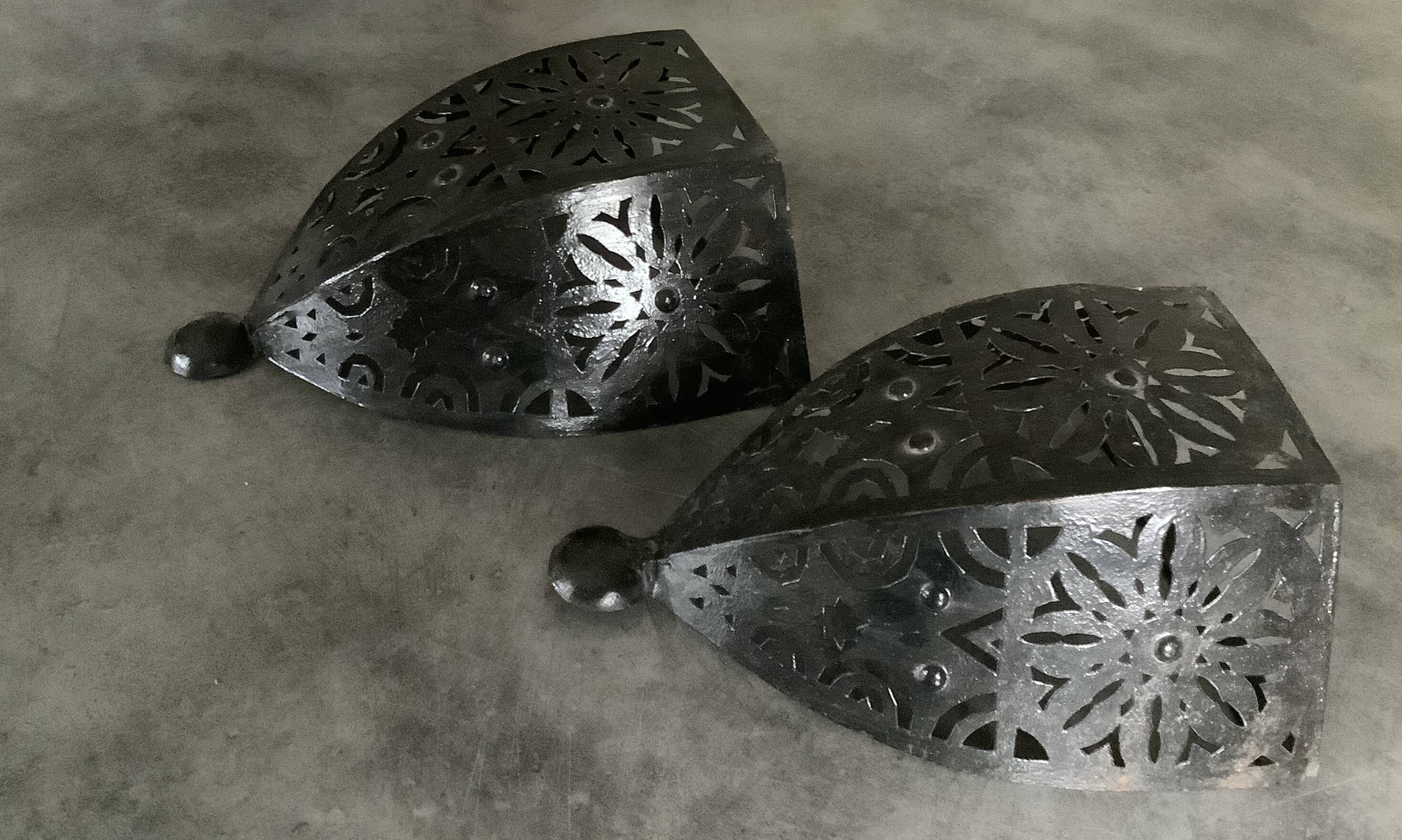 Pair of Wall Sconces in Iron with Cut-Out Patterns