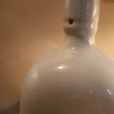 Triangular stoneware bottle