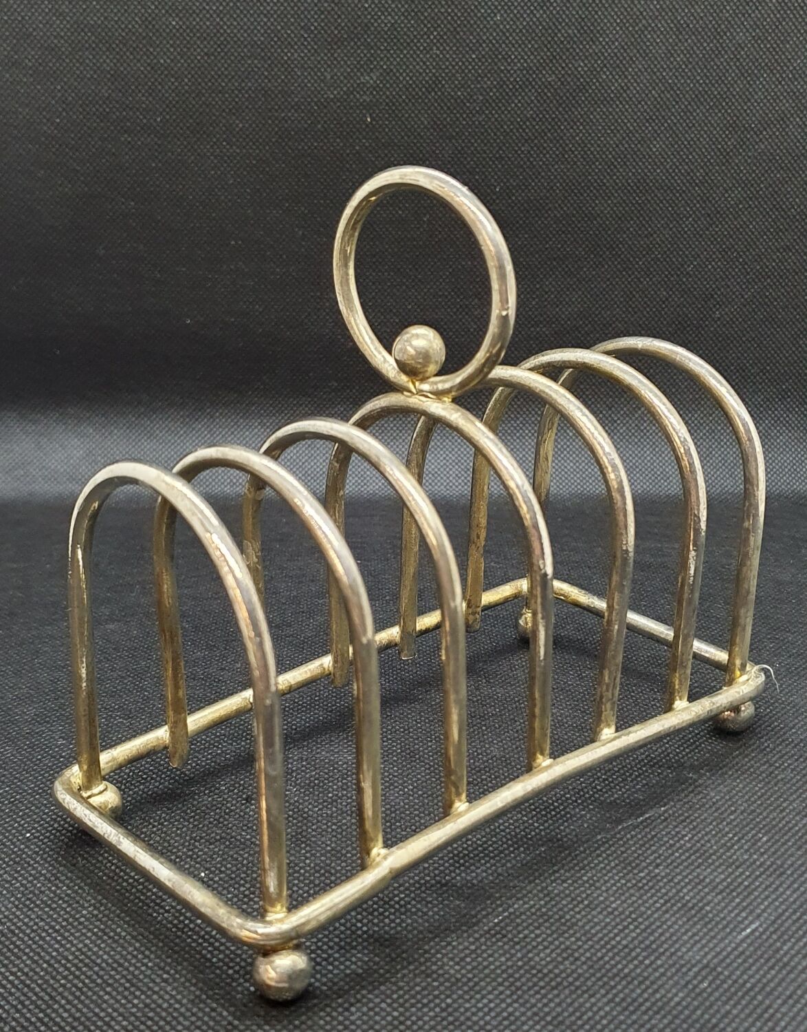 Toast holder in silver metal