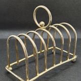 Toast holder in silver metal