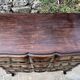Carved and moulded solid wood commode in the Louis XV style.