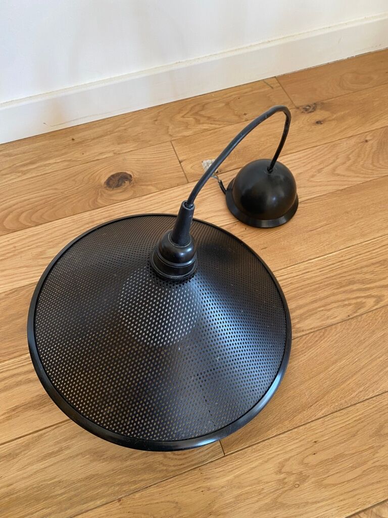 Black perforated metal suspension