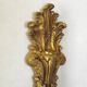 Pair of simple vintage French wall sconces in Art Nouveau bronze with leaf-shaped details.