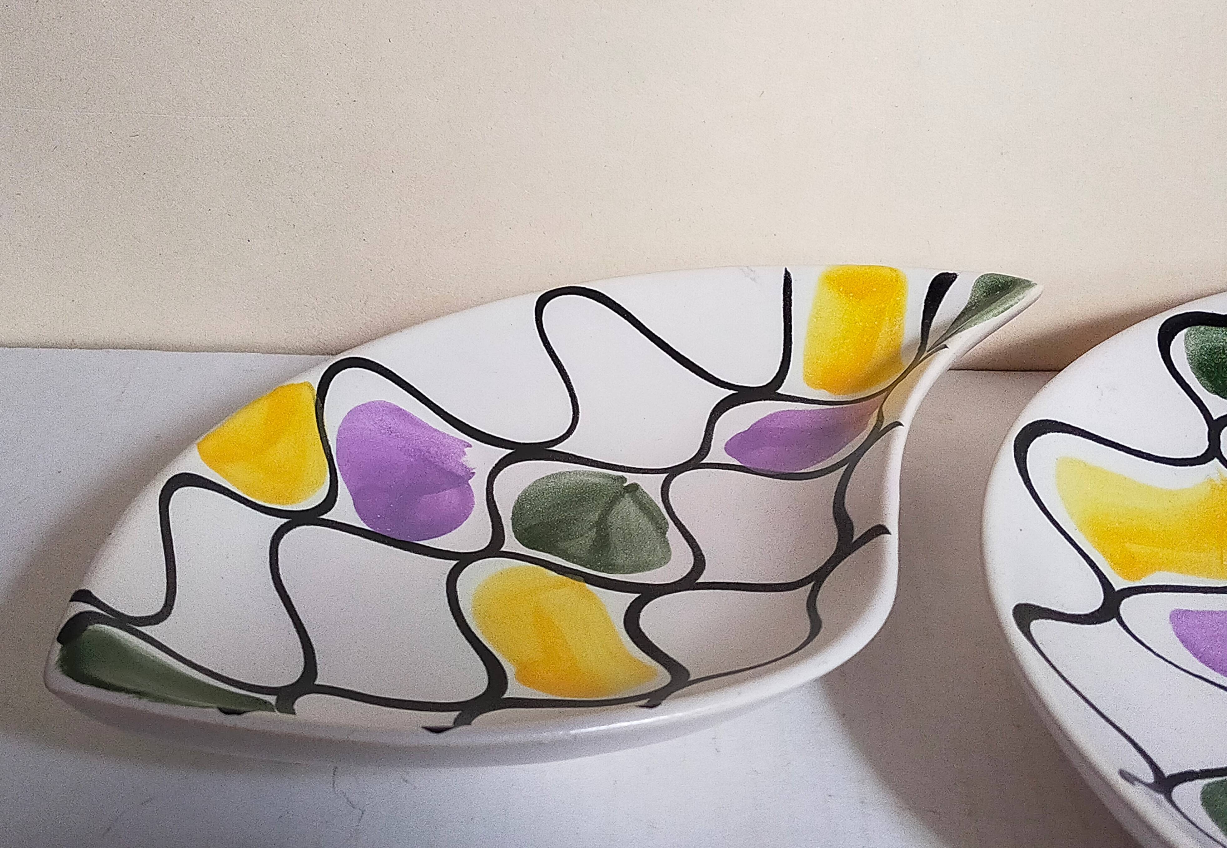 Three vintage free-form ceramic ravine dishes from the 1950s