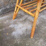Rattan coffee table with compass legs