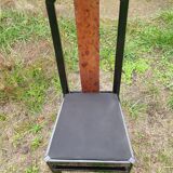 Octagonal table paul michel and its black lacquered chairs and elm magnifying glass