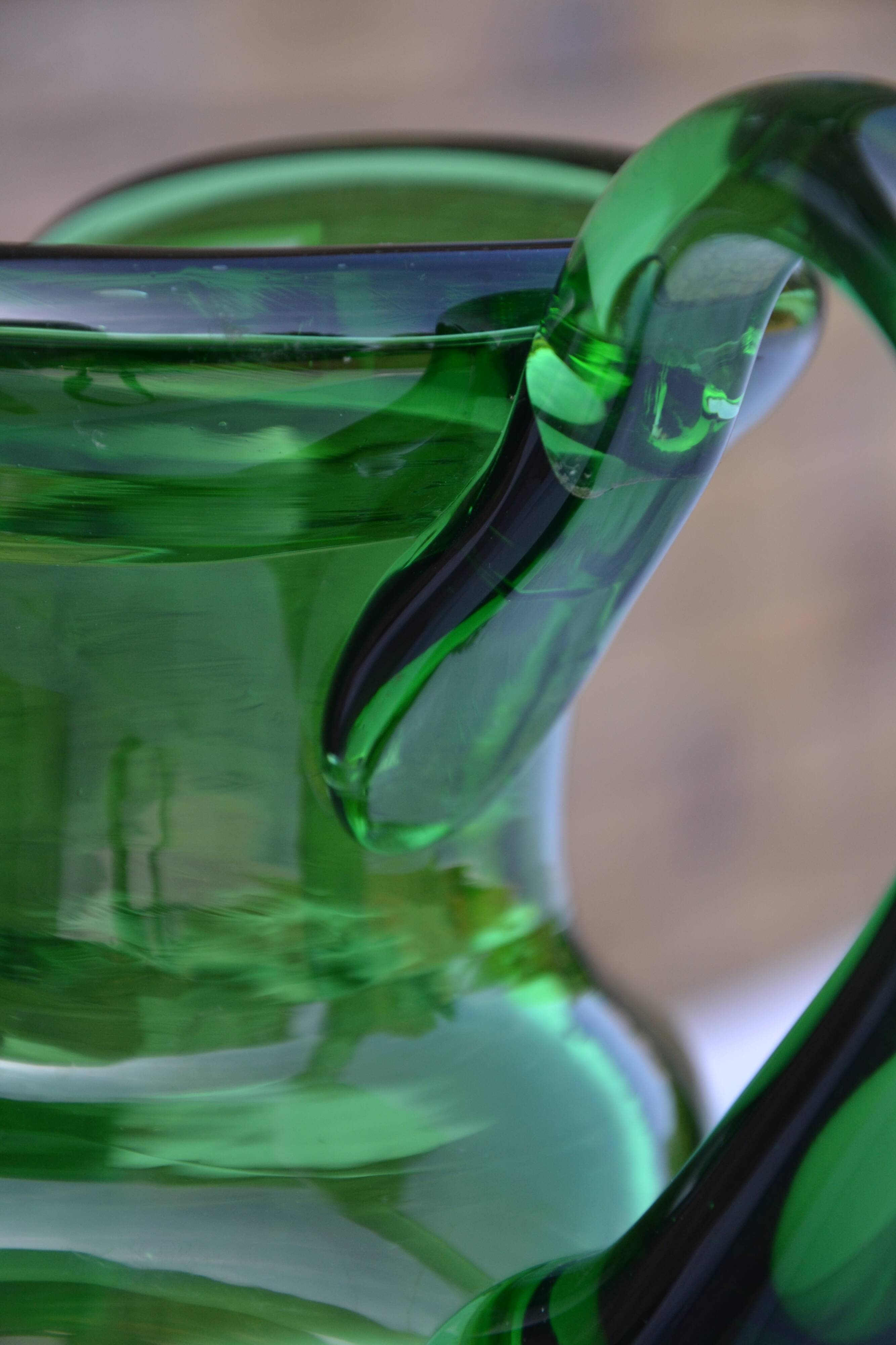 Handcrafted green glass pitcher from Spain