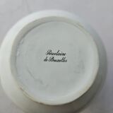 Brussels porcelain vase with a gold rim and flowers