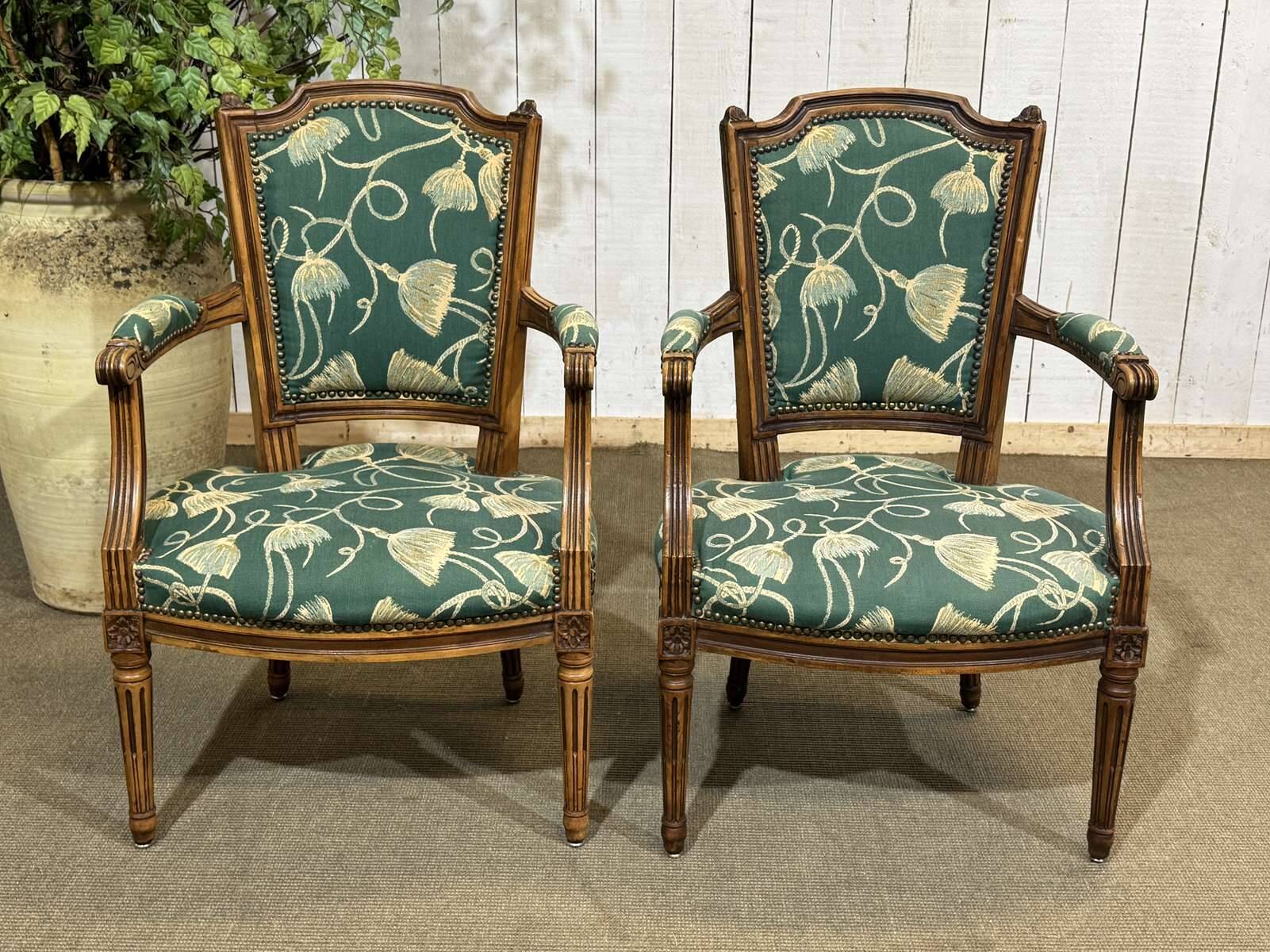 Pair of Louis XVI style armchairs in beech from the 19th century.