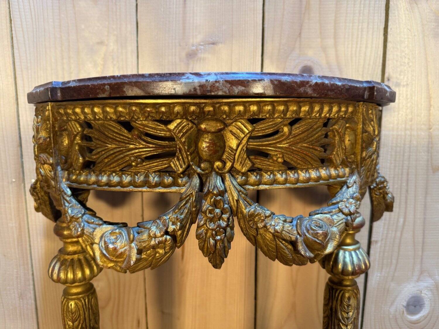Louis XVI style console in gilded and carved wood