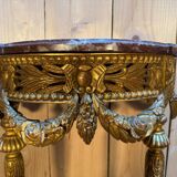 Louis XVI style console in gilded and carved wood