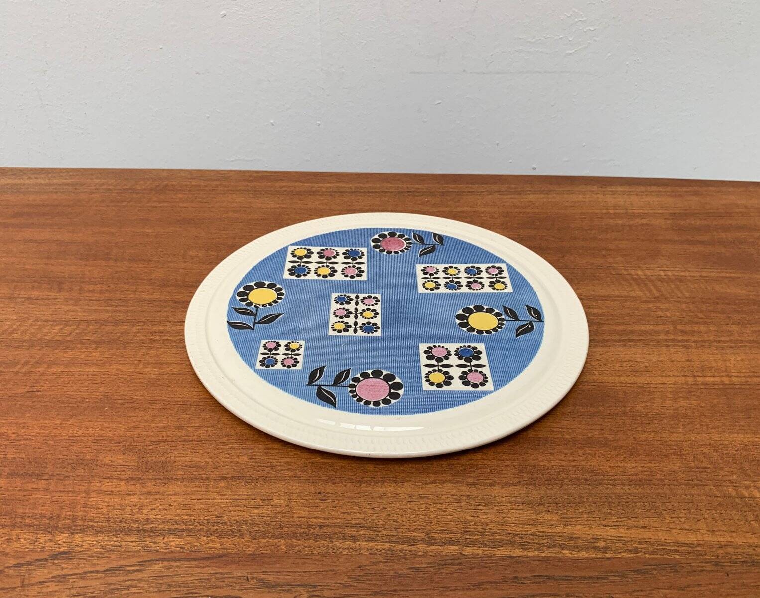 Mid-century German ceramic cake plate with floral patterns by Limburg, 1960s.