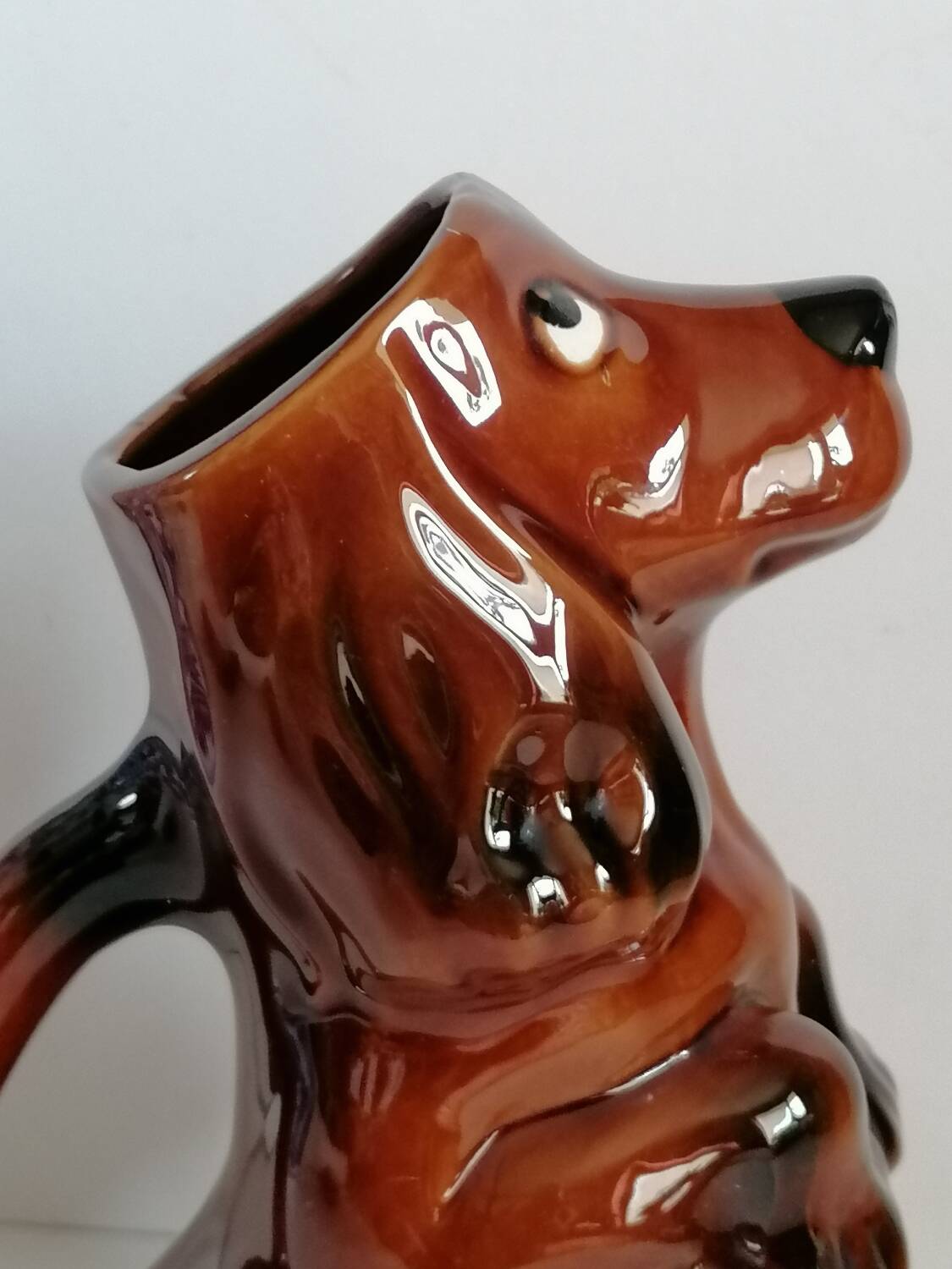 Zoomorphic dachshund dog pitcher in majolica slip