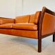Canapé vintage danois des années 60 en cuir cognac pour 2 personnes.