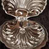 Silver-plated metal scallop butter dish and white glass bowl