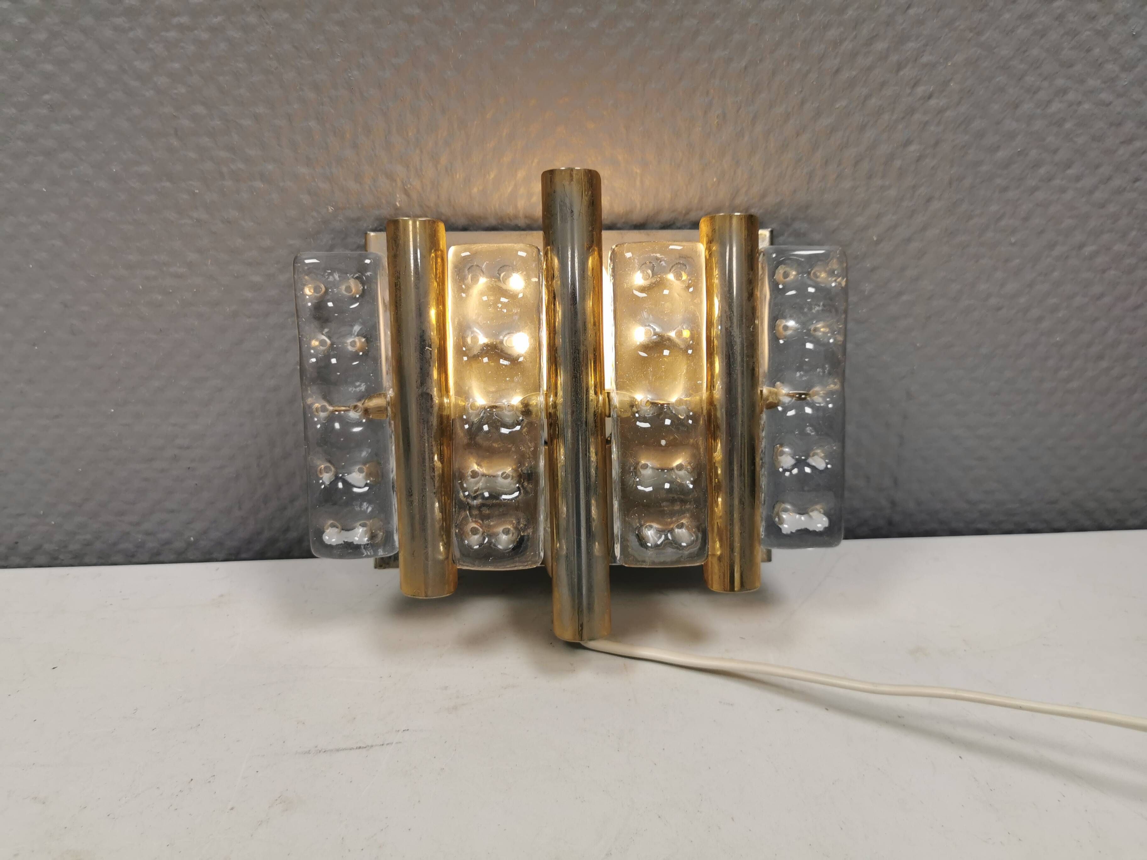 Old Swedish wall lamp, made of hard pressed glass, brass and metal 1960s
