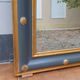 Louis-philippe grey and gilt mirror decorated in the antique style
