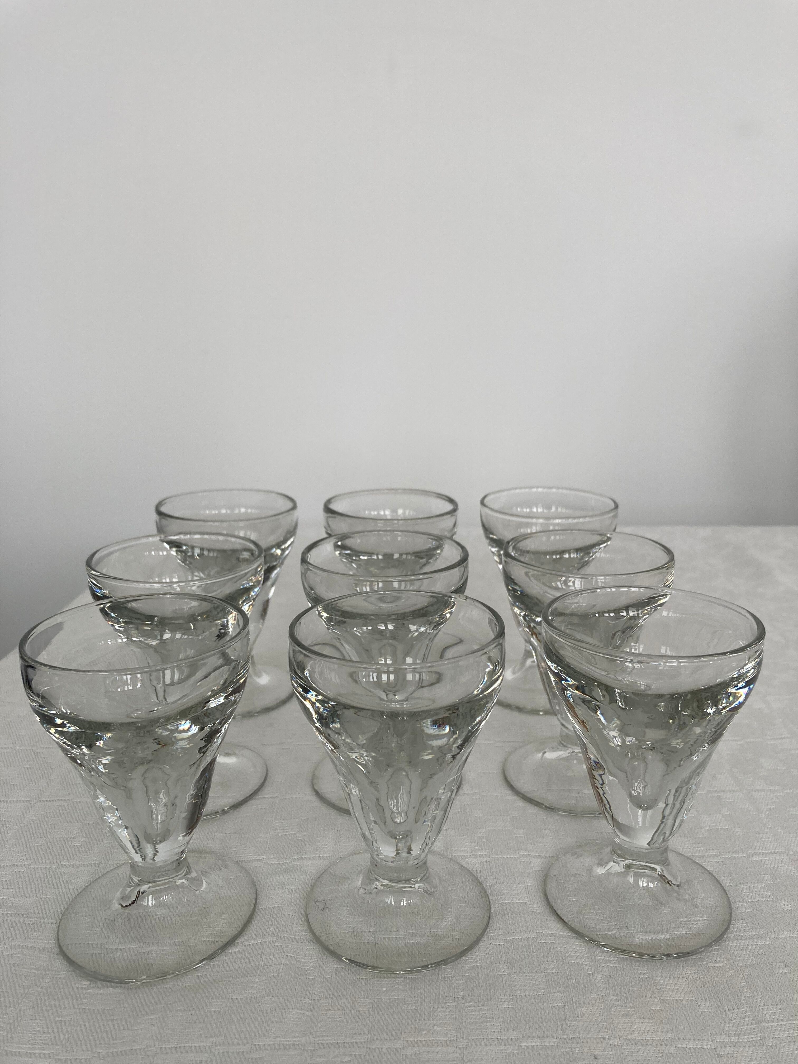 Set of 9 old glasses thick conical bottom
