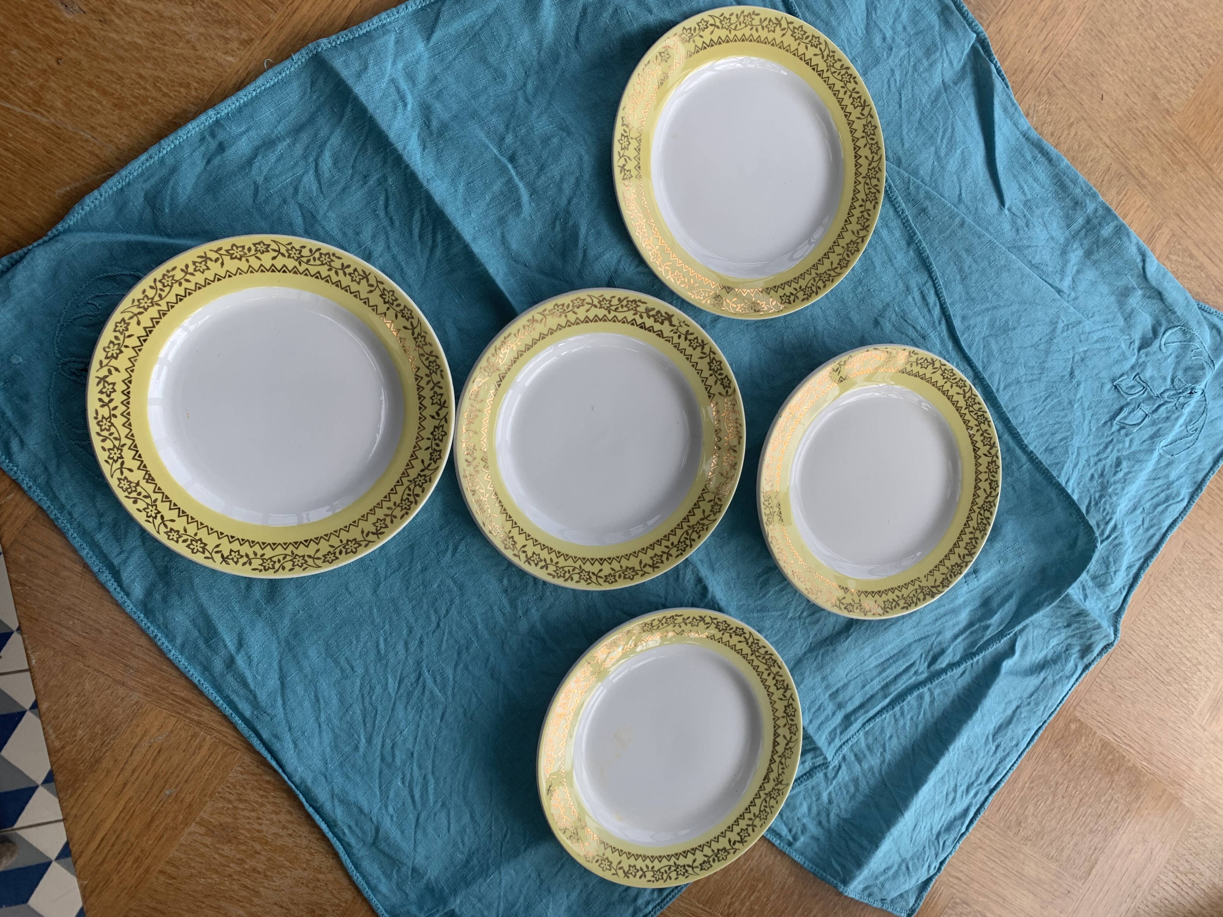 6 small plates with yellow borders and floral pattern gold antiques