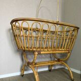 Wicker and rattan baby bed cradle with sail hoops on wheels