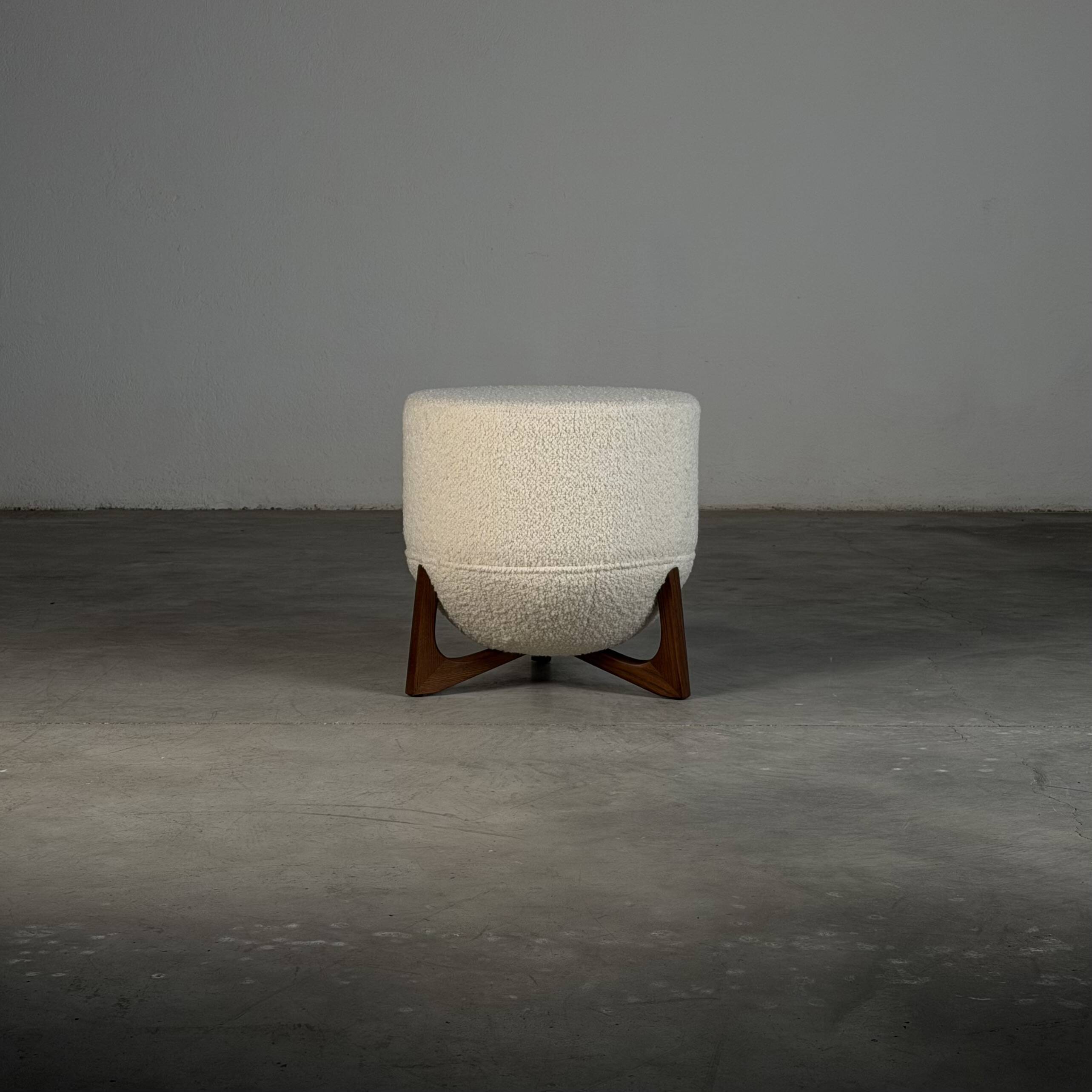 Totemo stool by forme, ivory dedar bouclé upholstery, walnut legs