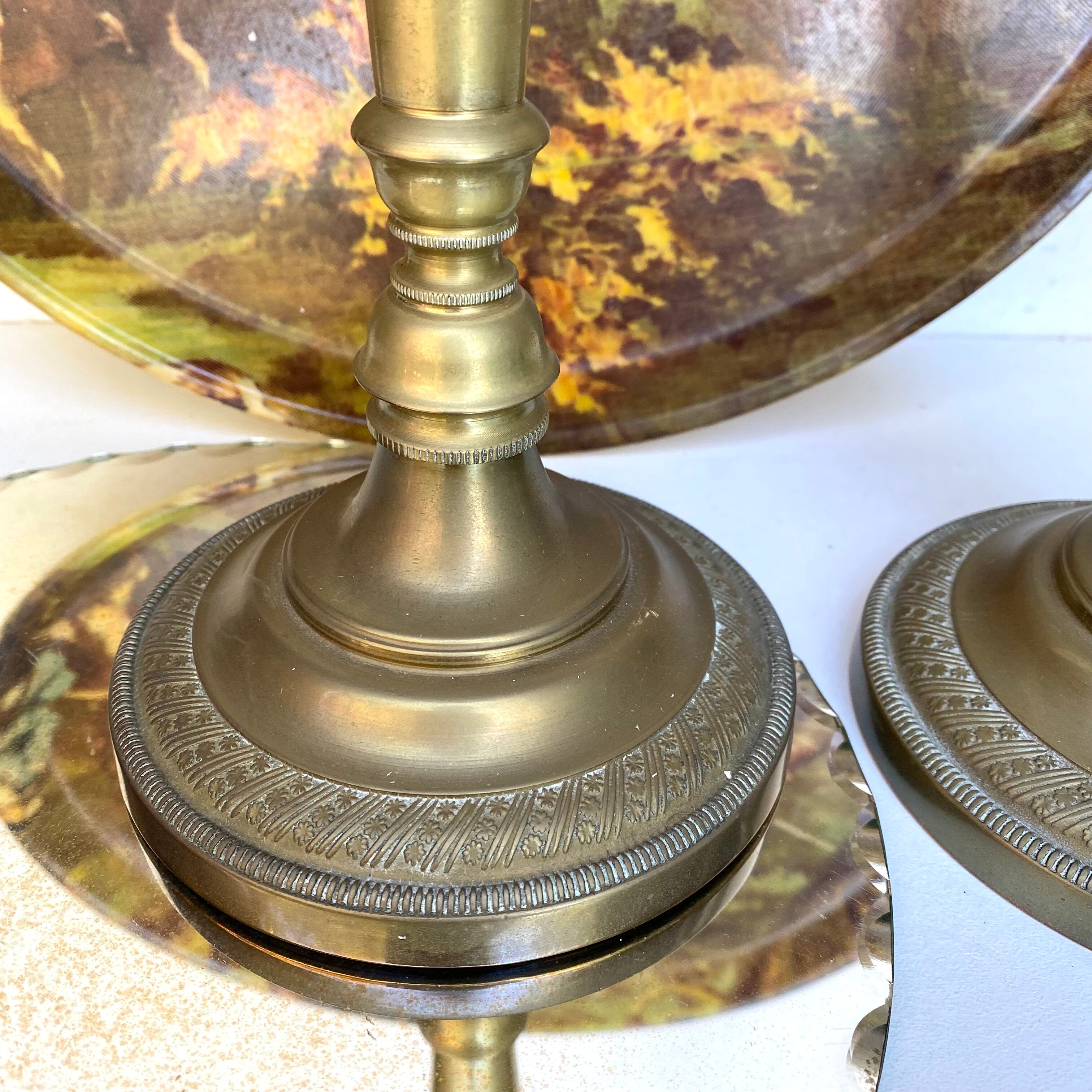 Pair of old candle holders in golden brass