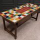 19th century oak farm table with multi-colored ceramic tiles