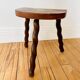 Vintage wooden half-moon tripod stool with twisted legs