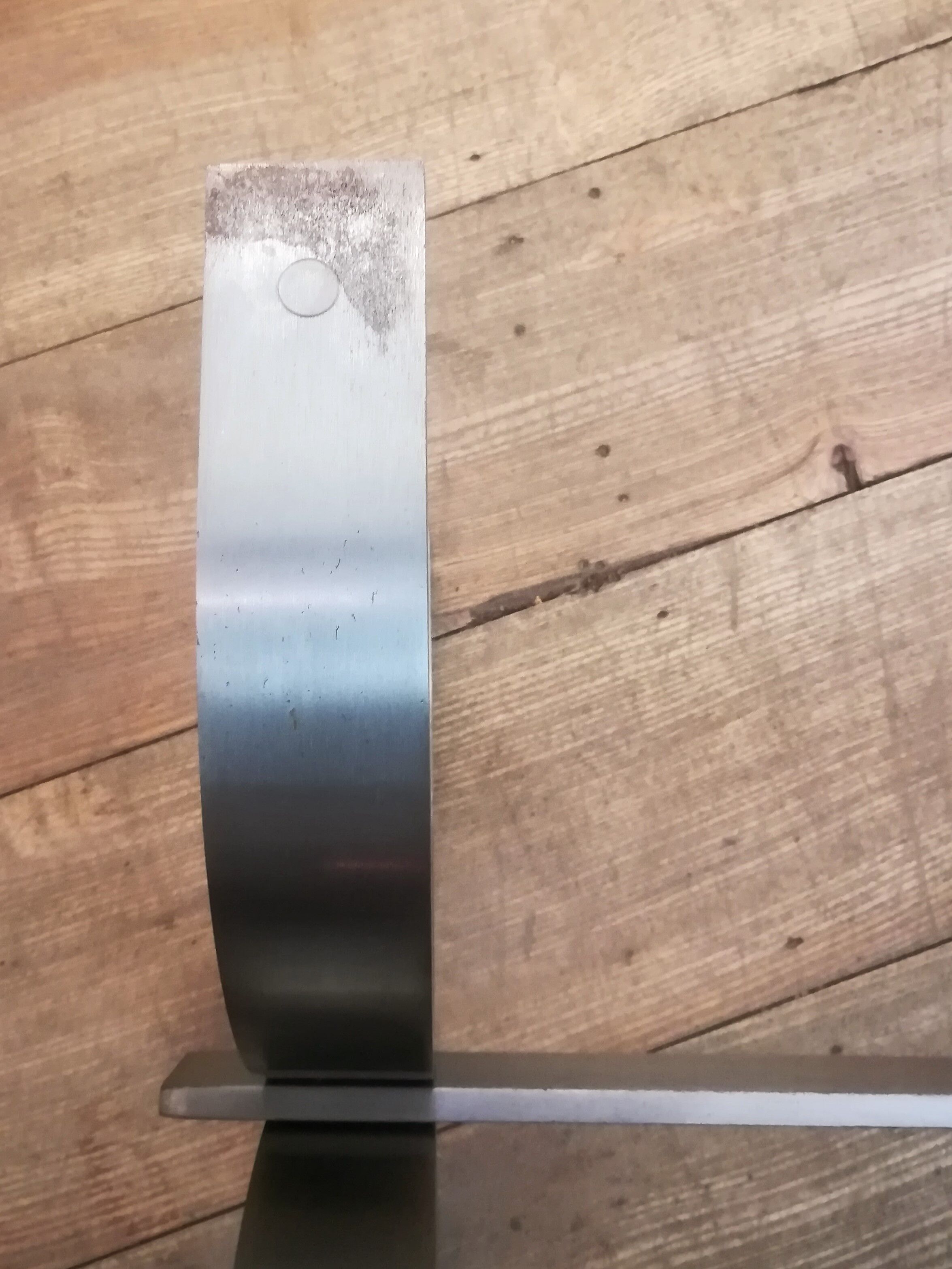 Table basse en acier brossé et verre fumé