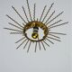 Spanish sunburst ceiling light – gilt iron rays & exposed bulb, 1960s