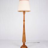 Pair of turned wooden floor lamps in Art Deco style, France, mid-20th century.
