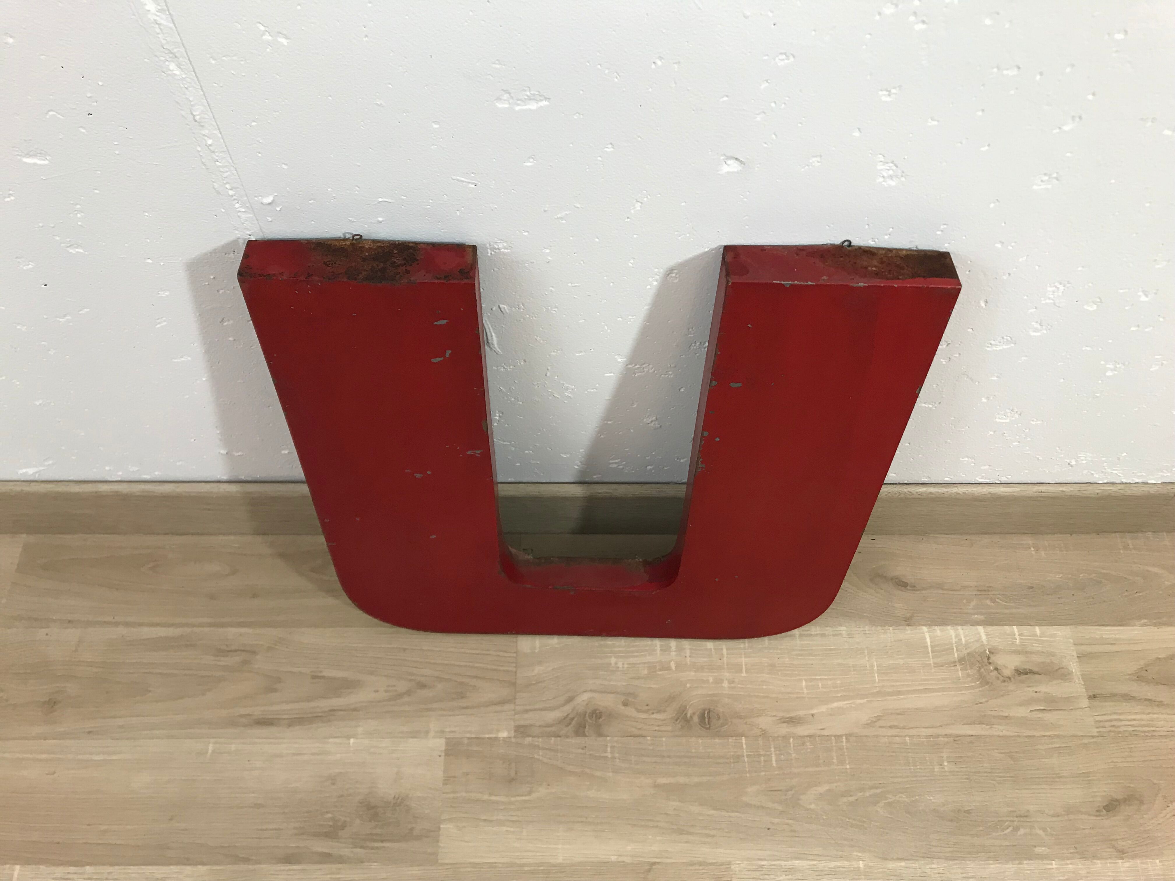 Old metal letter "U"