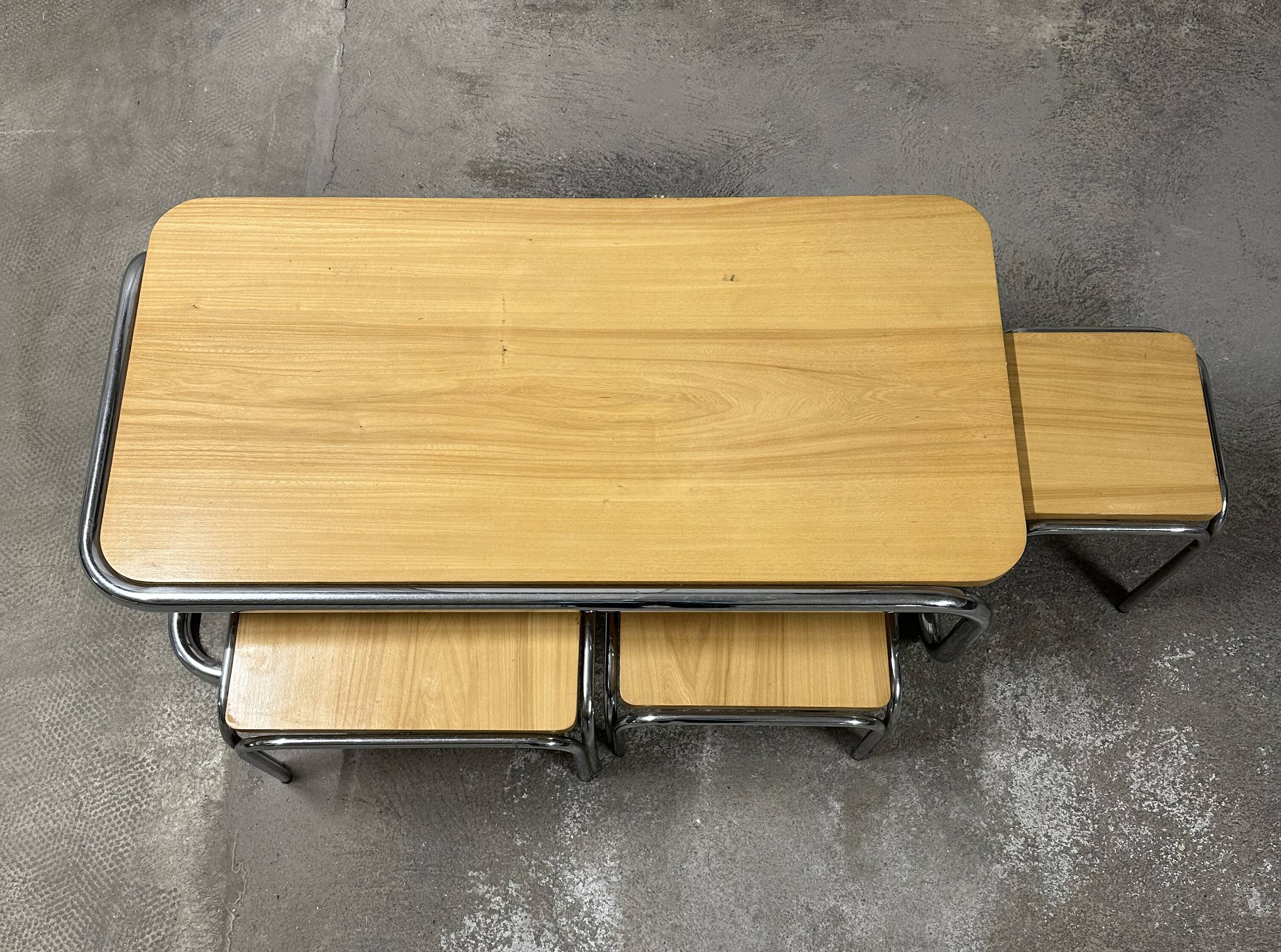 Set of 4 nesting coffee tables from the 70s, metal and solid oak.