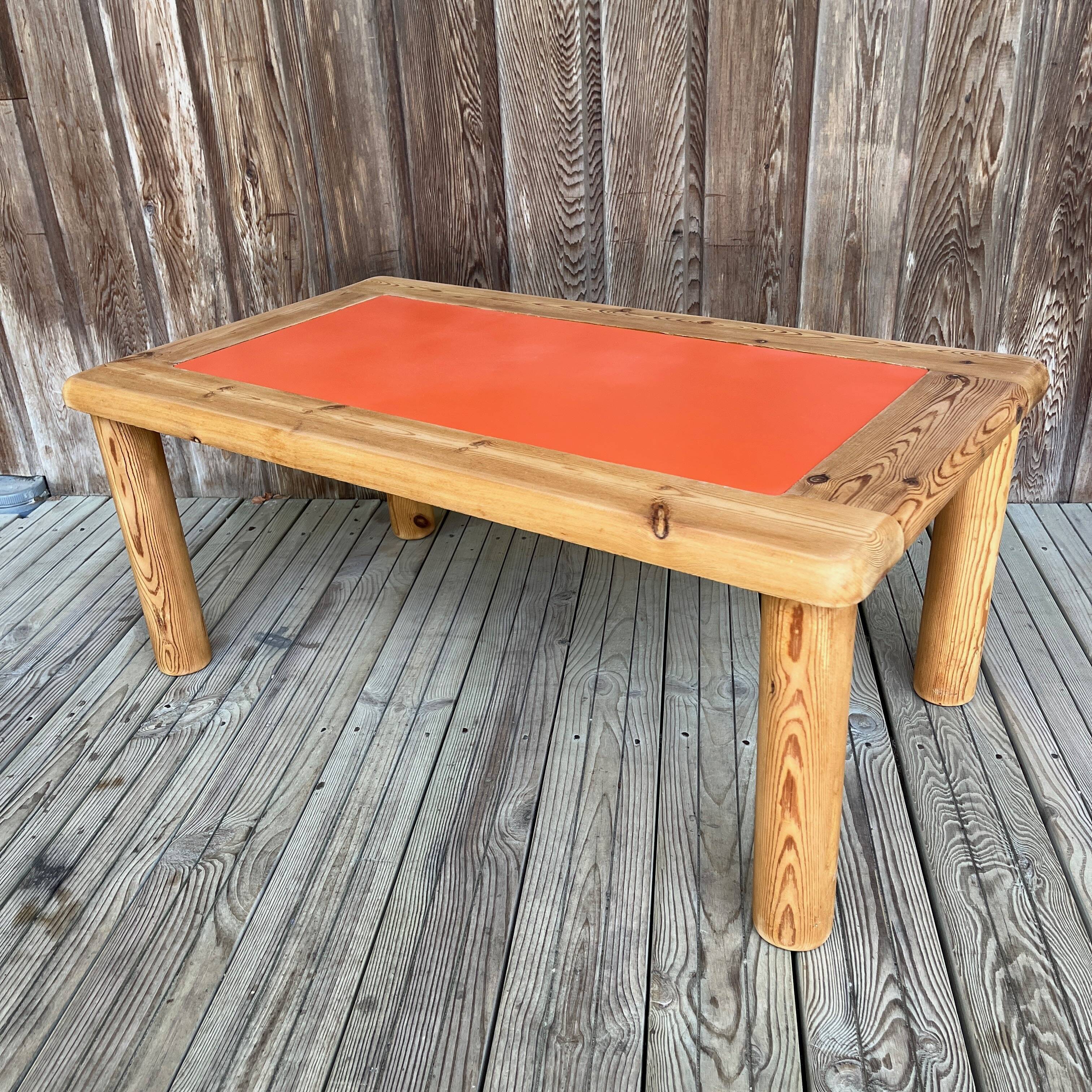 Modernist pine and orange lacquered coffee table, 1970s
