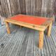 Modernist pine and orange lacquered coffee table, 1970s