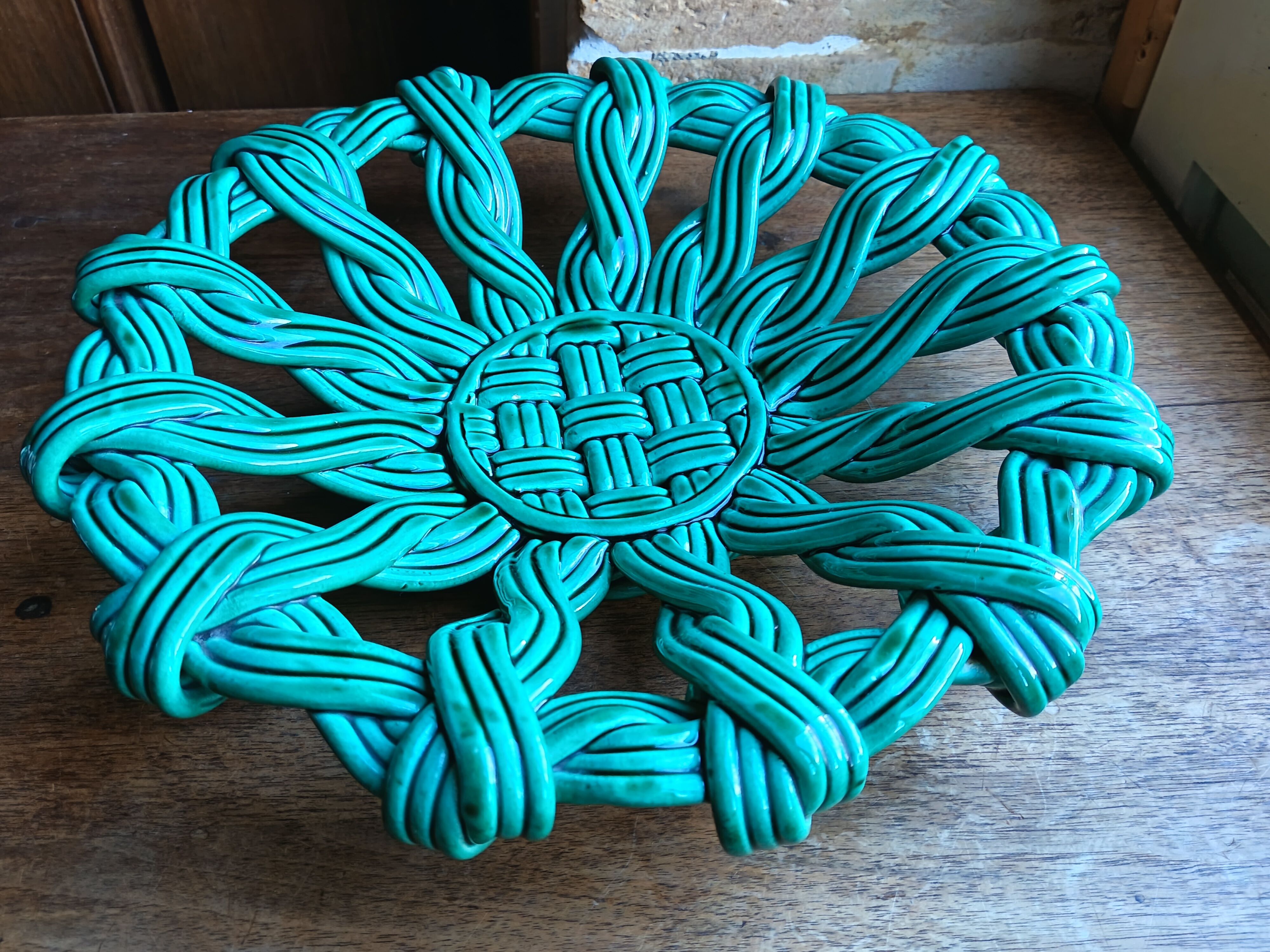 Woven green ceramic basket