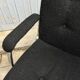 Black mottled fabric and chrome swivel armchair, 1