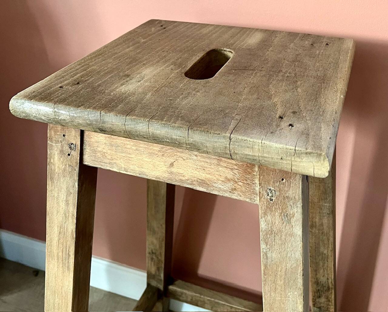 High wooden stool