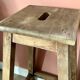 High wooden stool