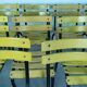 18 yellow metal bistro chairs
