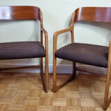 Pair of Baumann armchairs, model "sled", 1960