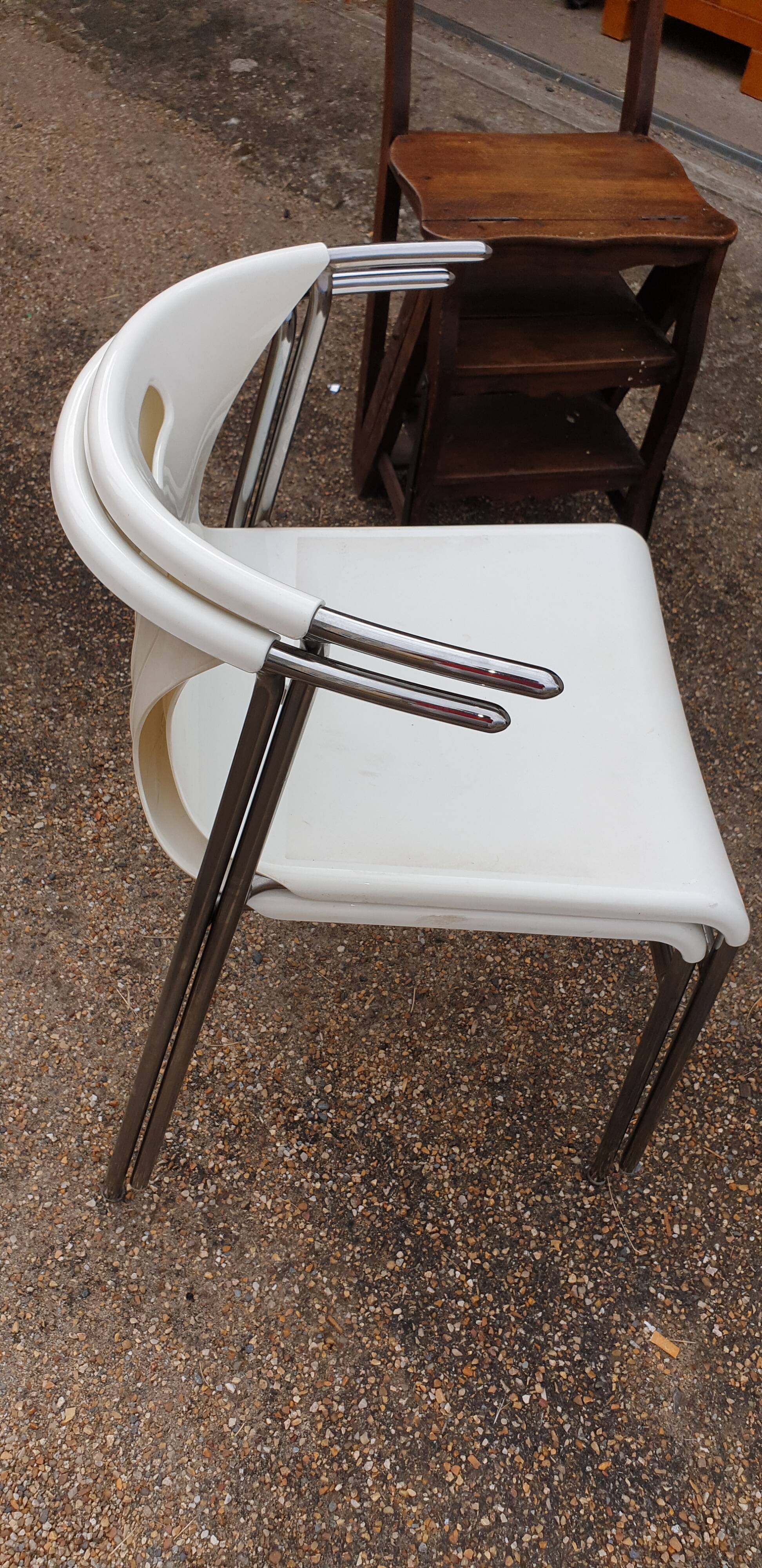 Pair of chrome and resin design armchairs