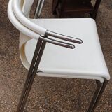 Pair of chrome and resin design armchairs