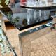Chrome and smoked glass coffee table on wheels 1970