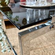 Chrome and smoked glass coffee table on wheels 1970