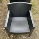 2 black Toy chairs designed by Starck