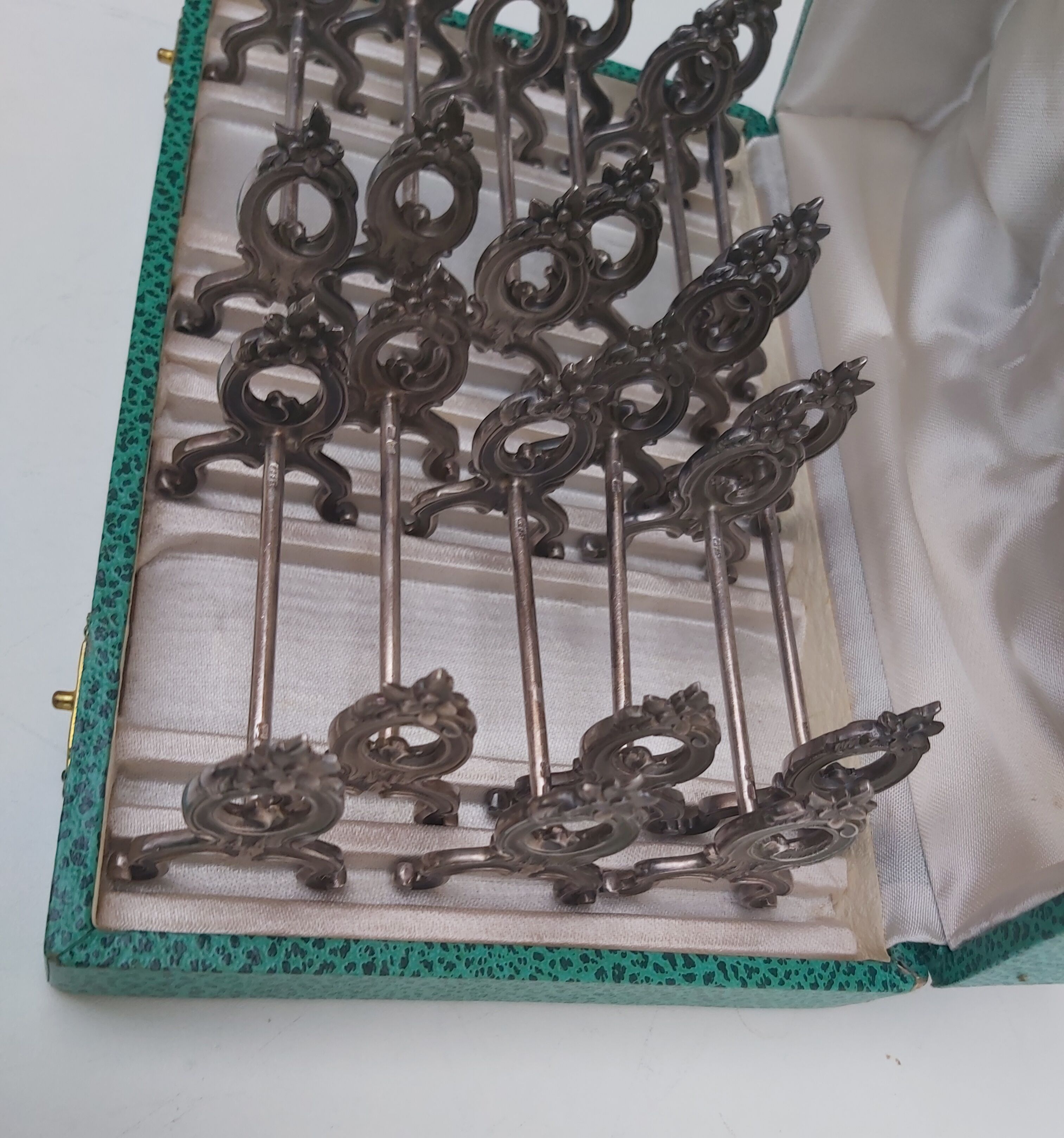 12 knife holders in their SFAM silver metal box