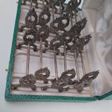 12 knife holders in their SFAM silver metal box