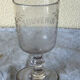 Ancient glass engraved "remembering the party"